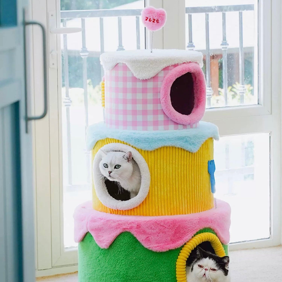 zeze three-layer cake cat tree in green, yellow and pink gingham with round hideaways and spring toys