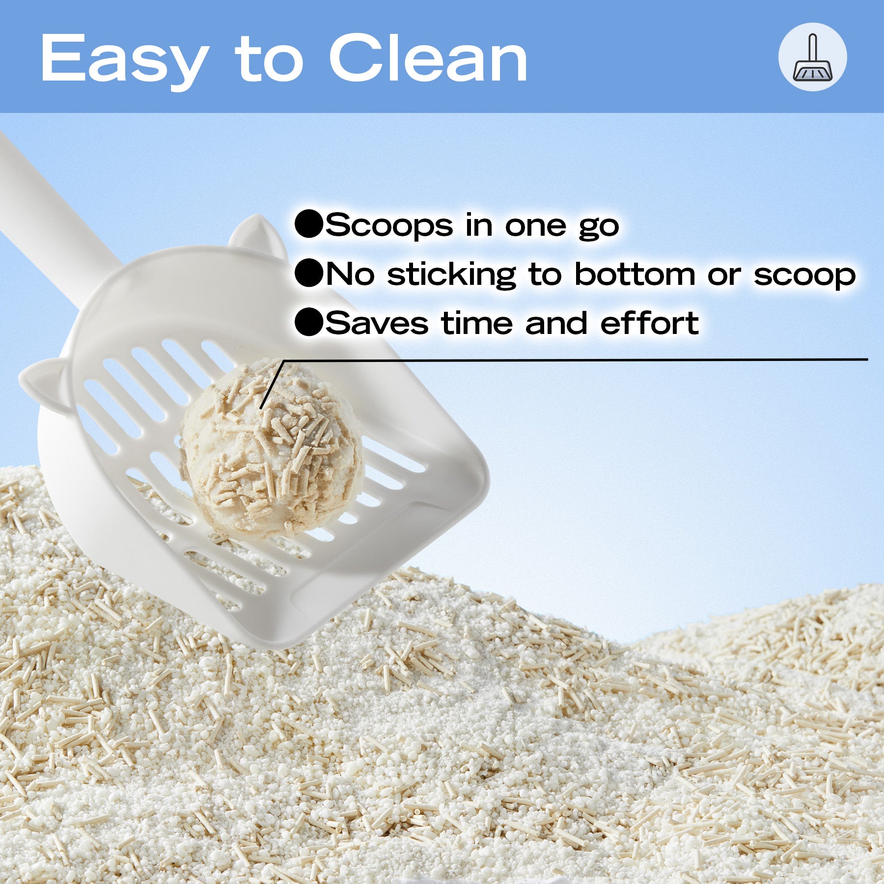 White plastic cat-head litter scoop with sifting slots for efficient cleaning.
