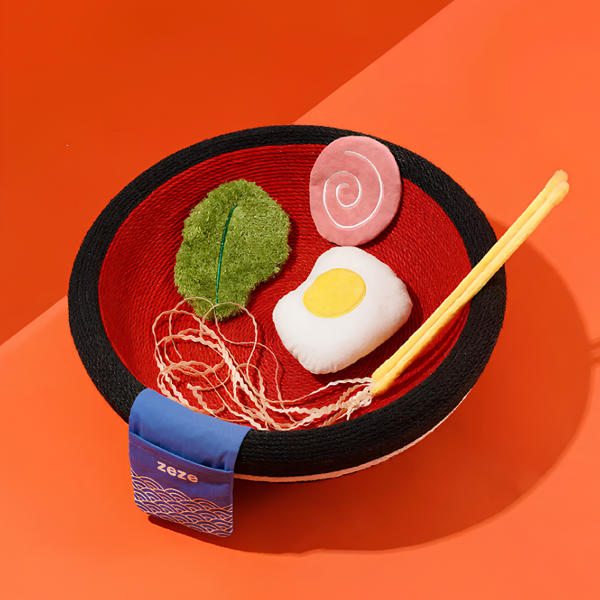 zeze big ramen bowl cat scratcher in black and red rope with plush egg, fishcake and chopsticks