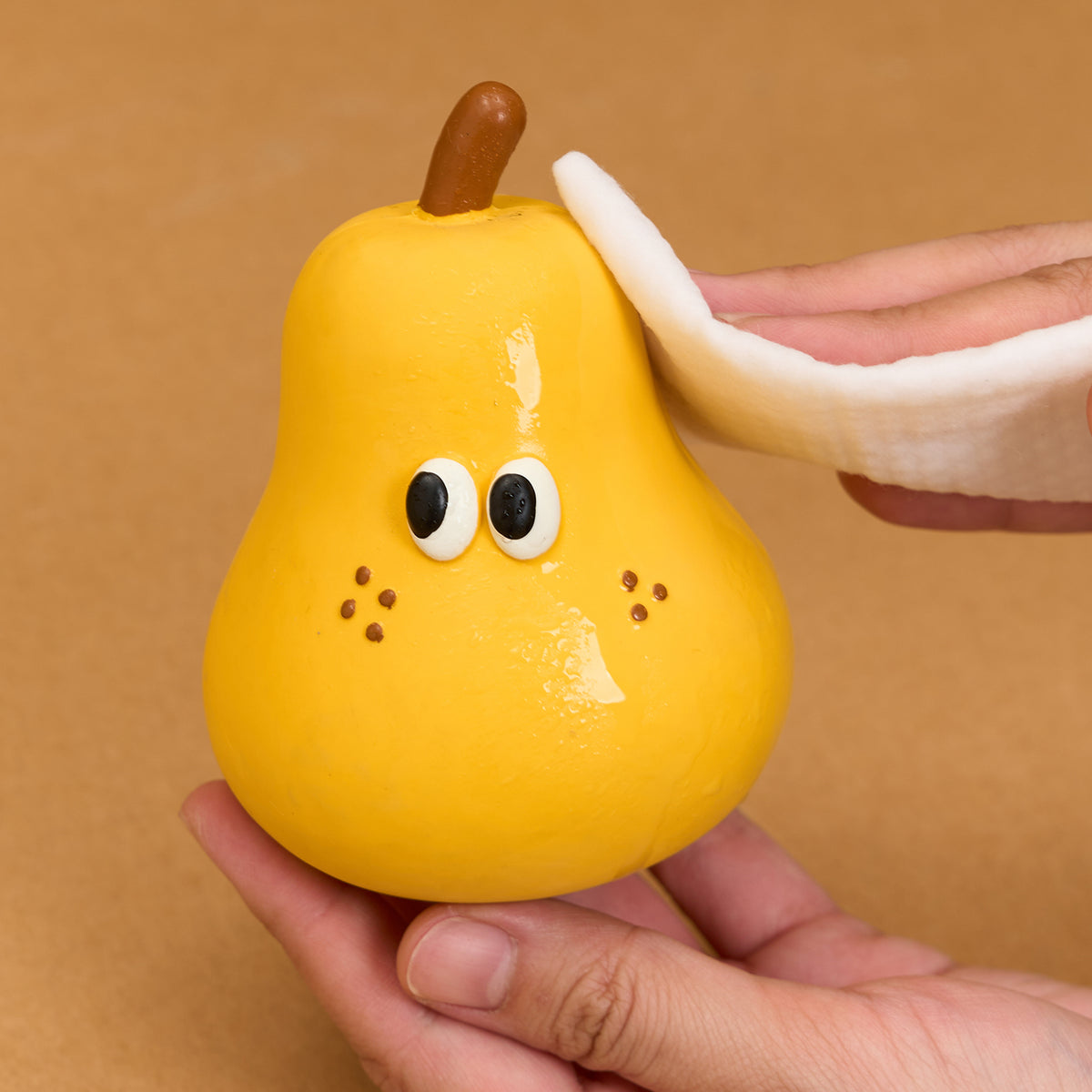 zeze latex squeaky dog toys shaped like broccoli, a half apple, a pear and an orange