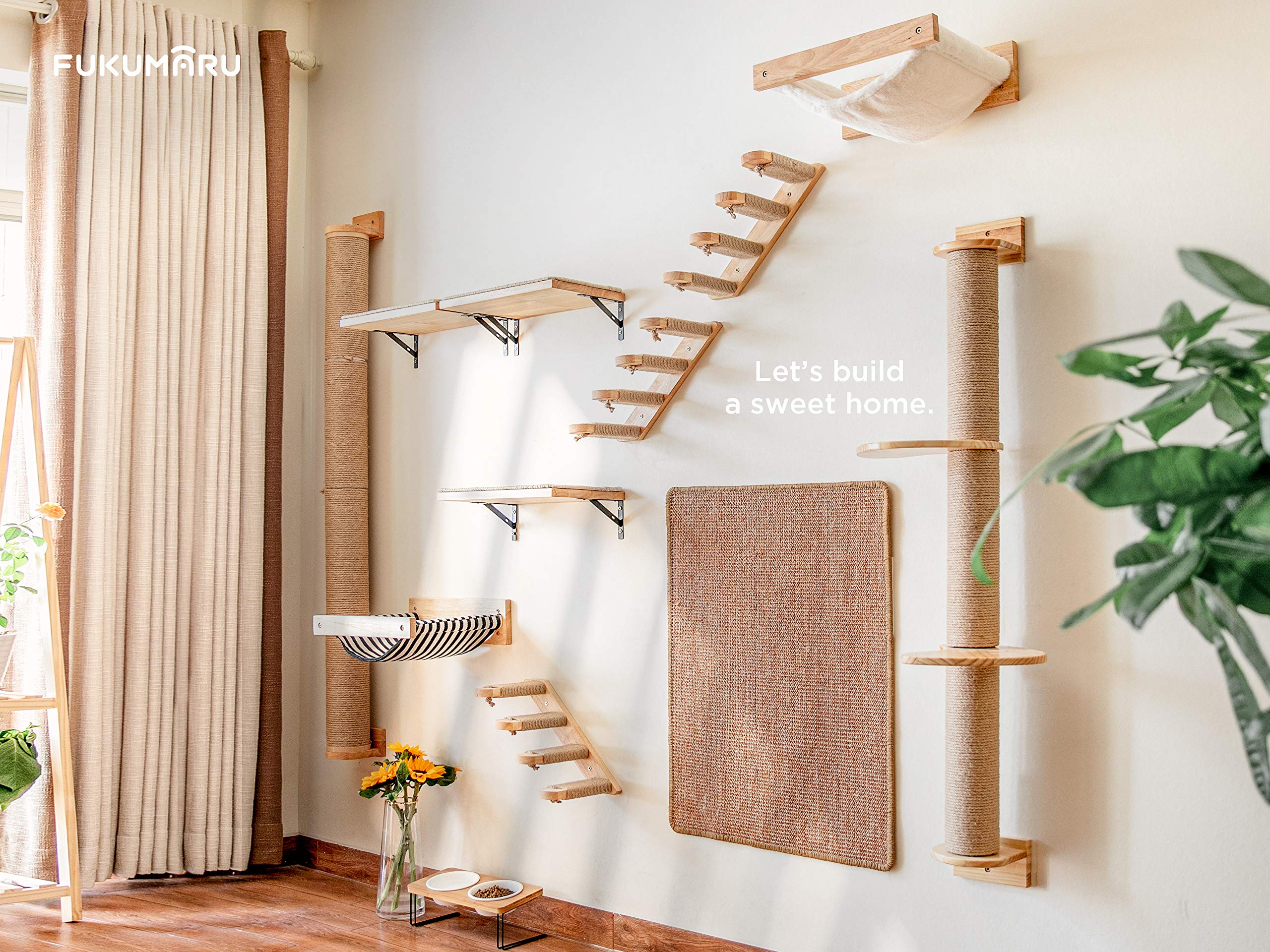 Modular sisal cat wall furniture with posts, shelves, hammocks, and 60x80cm scratching mat.