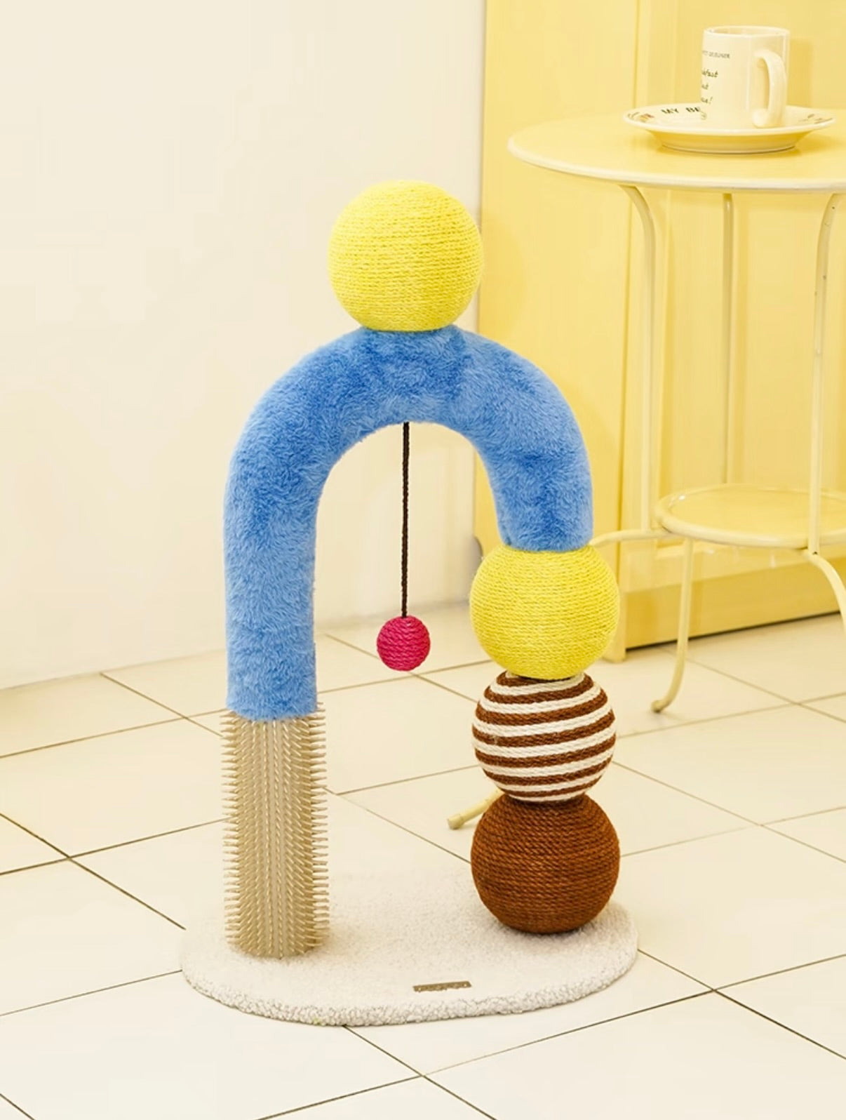 Stylish zeze cat arch tree with sisal scratcher, grooming pole, and hanging balls for play and rest.