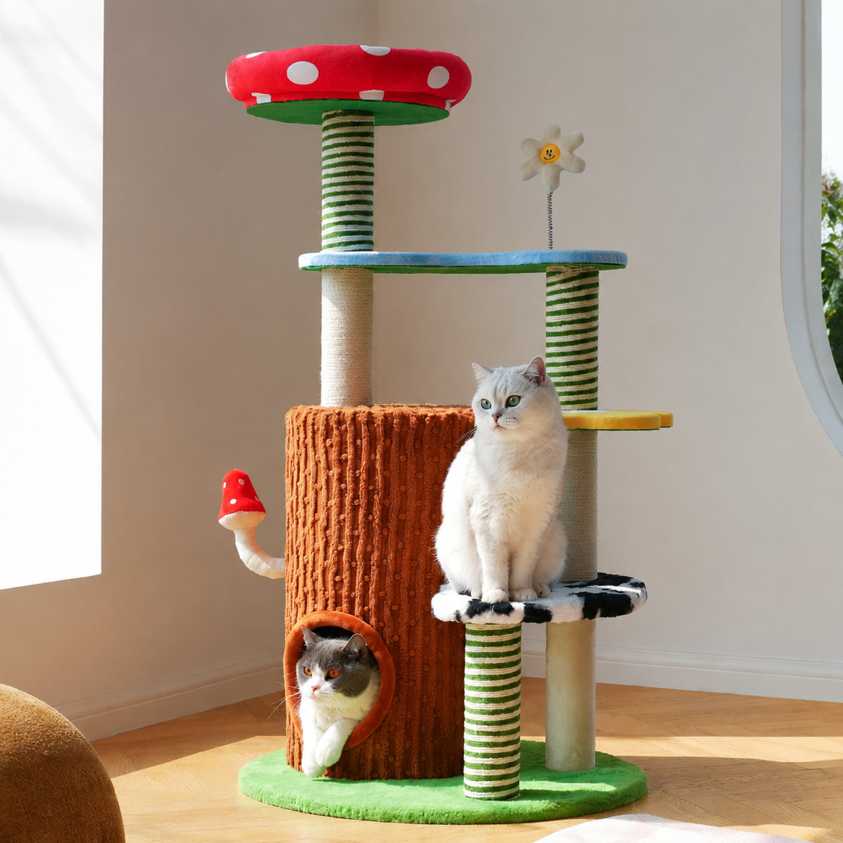 zeze Deluxe 3-in-1 cat tower, cat on the cow-print perch with a cat in the lower condo