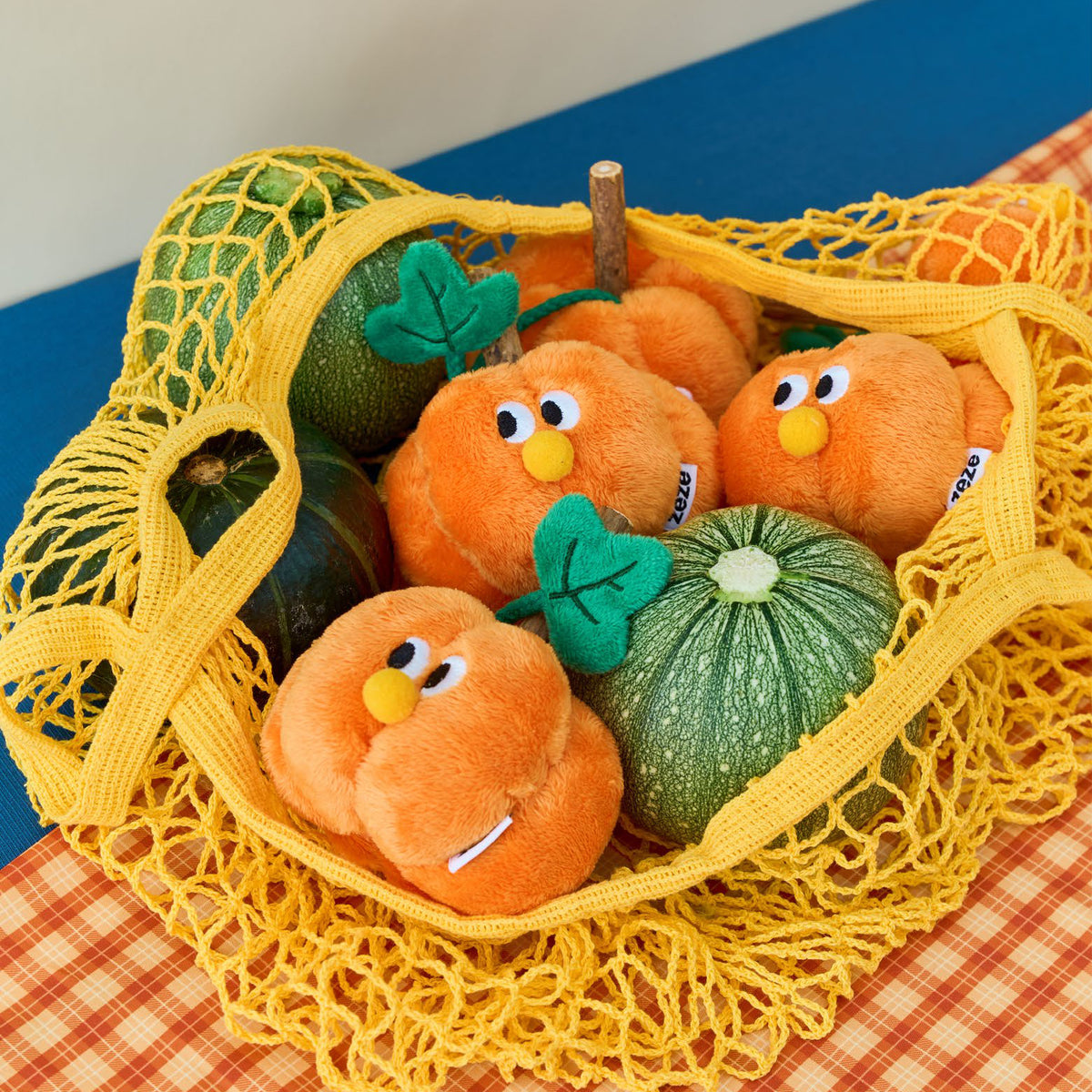 zeze Pumpkin silvervine cat toy, plush pumpkins and real squash in a yellow net bag