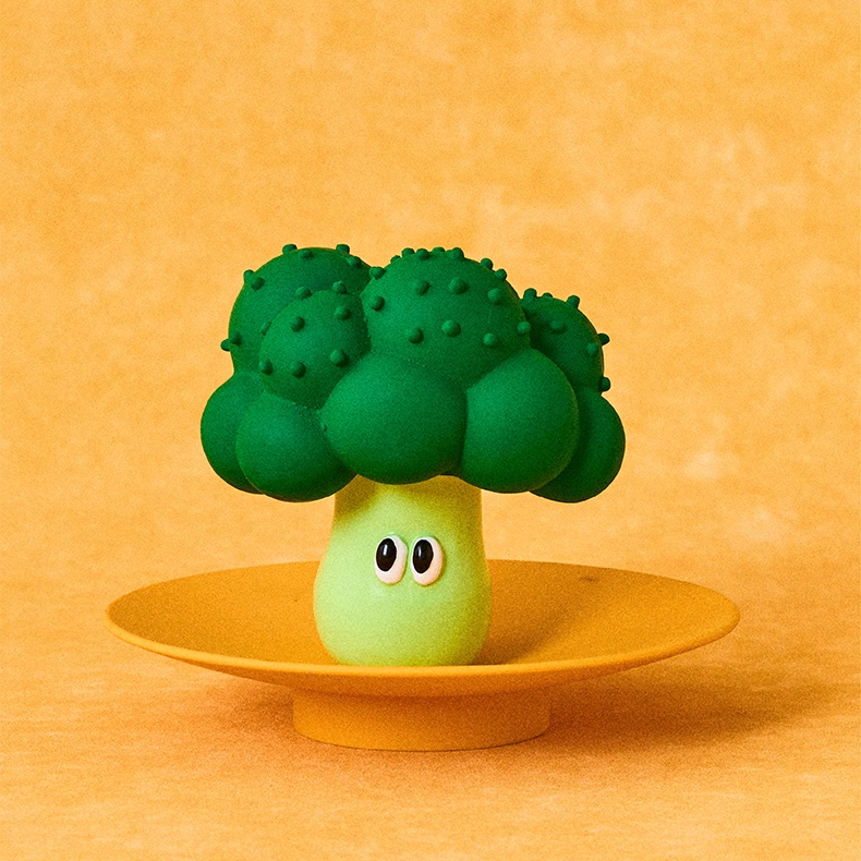 zeze latex squeaky dog toys shaped like broccoli, a half apple, a pear and an orange