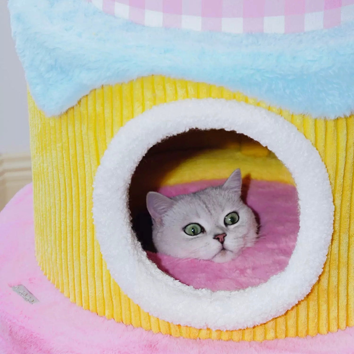 zeze three-layer cake cat tree in green, yellow and pink gingham with round hideaways and spring toys
