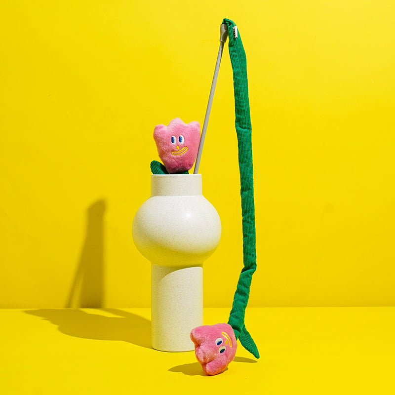 zeze cat teaser wand with a pink plush tulip on a green corduroy stem and pink handle