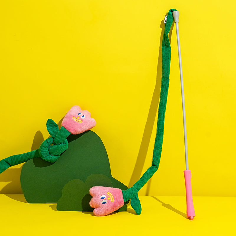 zeze cat teaser wand with a pink plush tulip on a green corduroy stem and pink handle