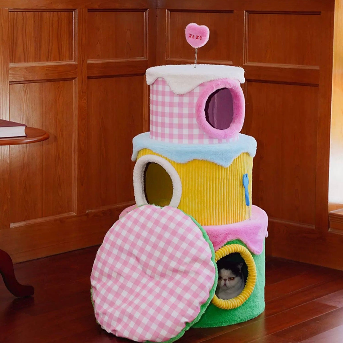 zeze three-layer cake cat tree in green, yellow and pink gingham with round hideaways and spring toys