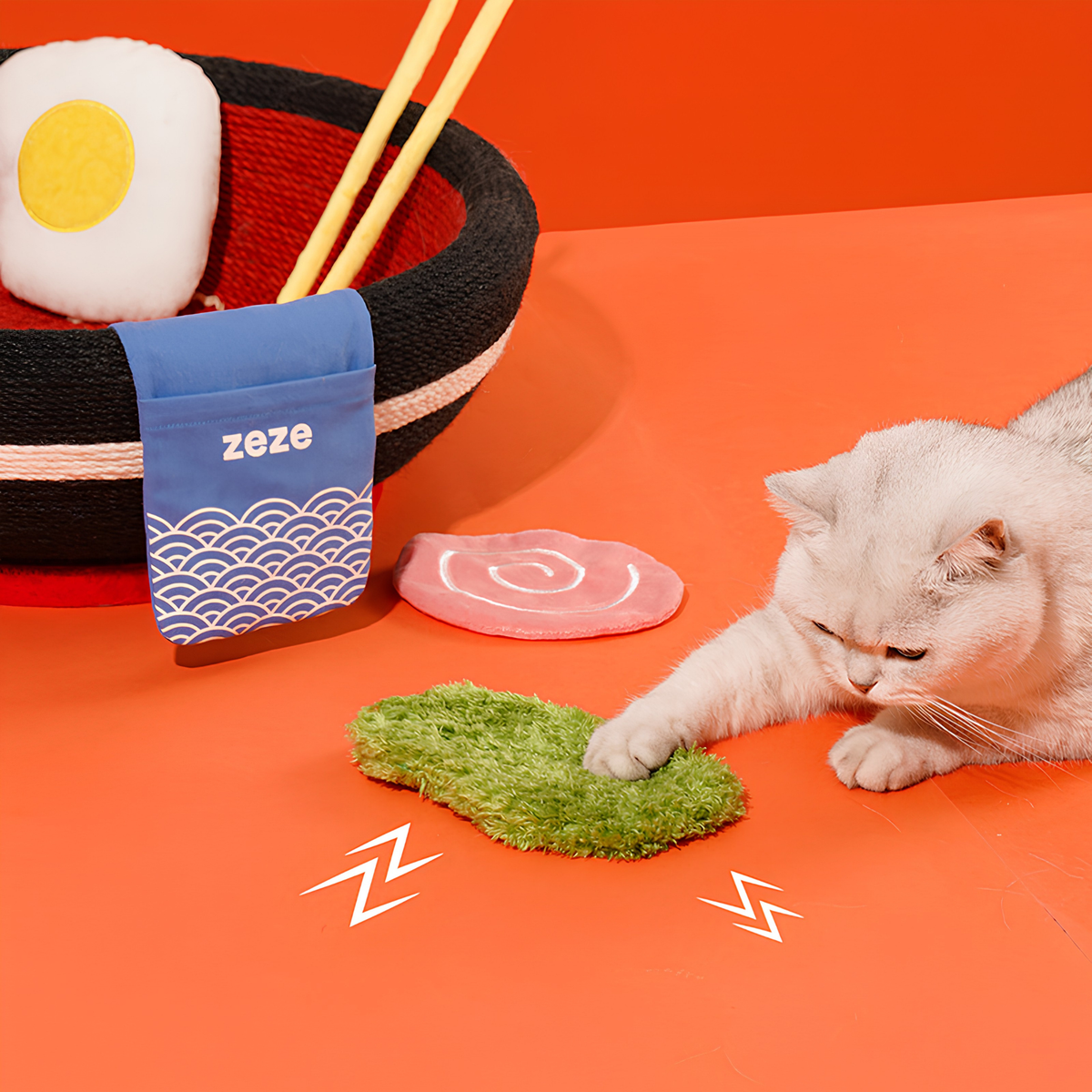 zeze big ramen bowl cat scratcher in black and red rope with plush egg, fishcake and chopsticks