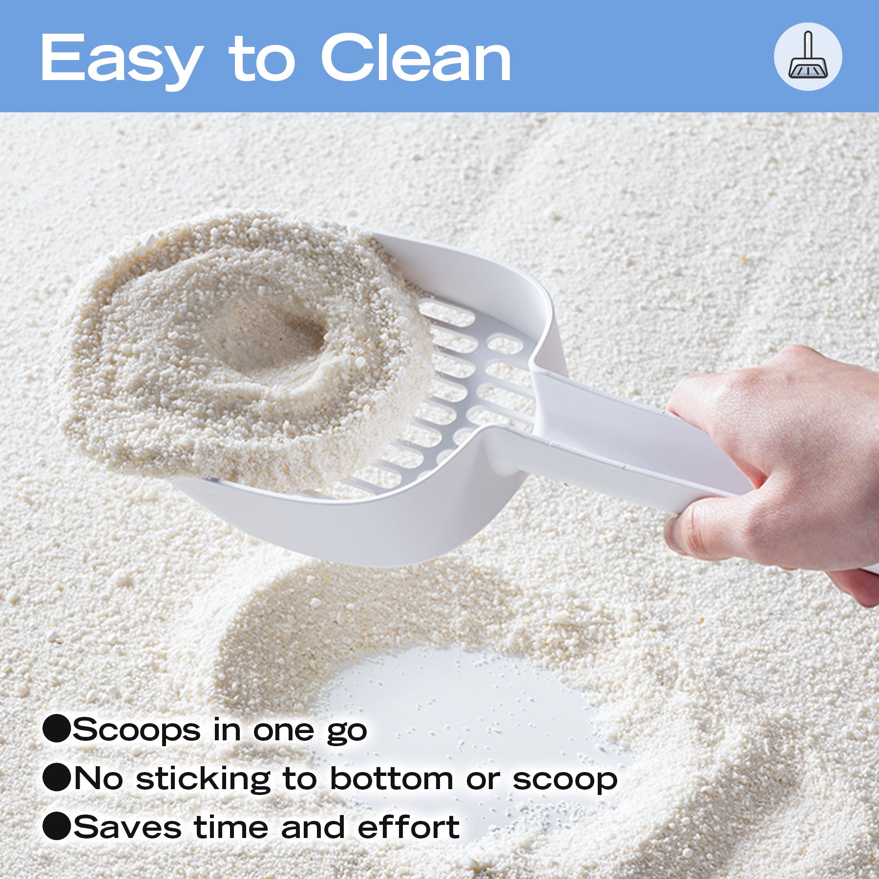 White plastic cat litter scoop in use, sifting slots, managing litter boxes.