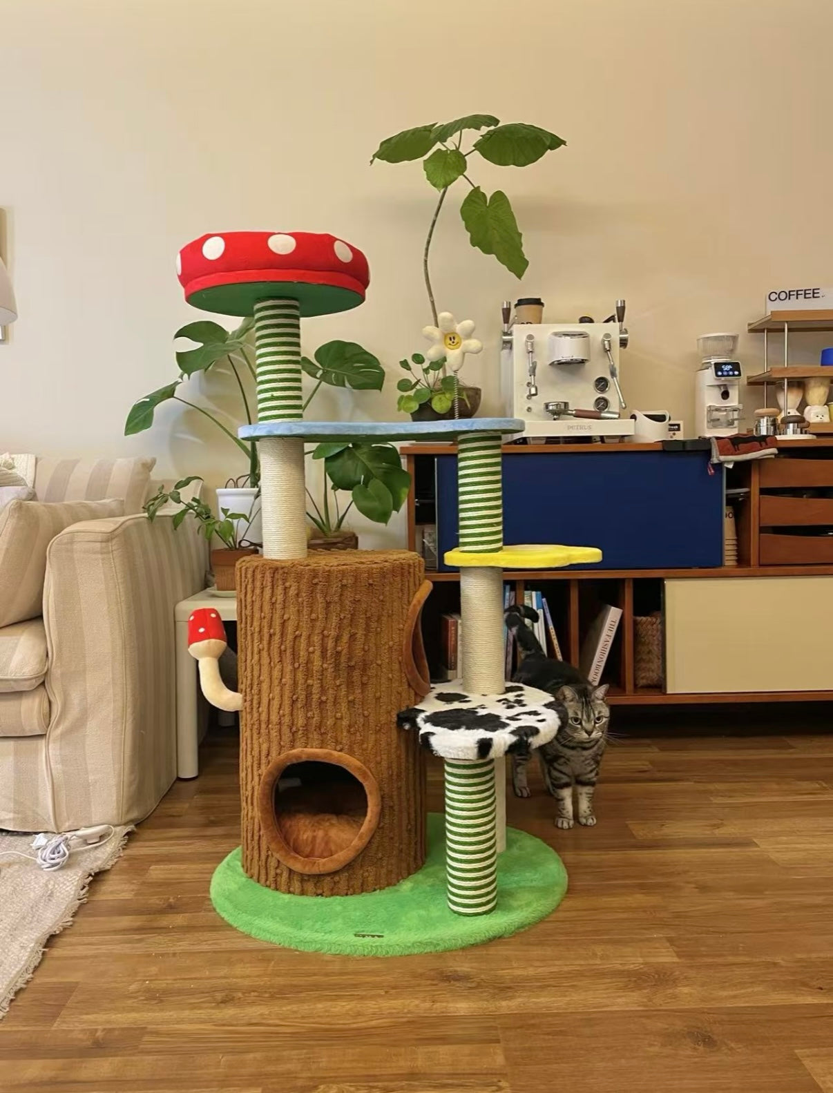 Deluxe 3-in-1 cat tree with mushroom bed, sisal scratchers, and cow print perch. Multi-level tower.