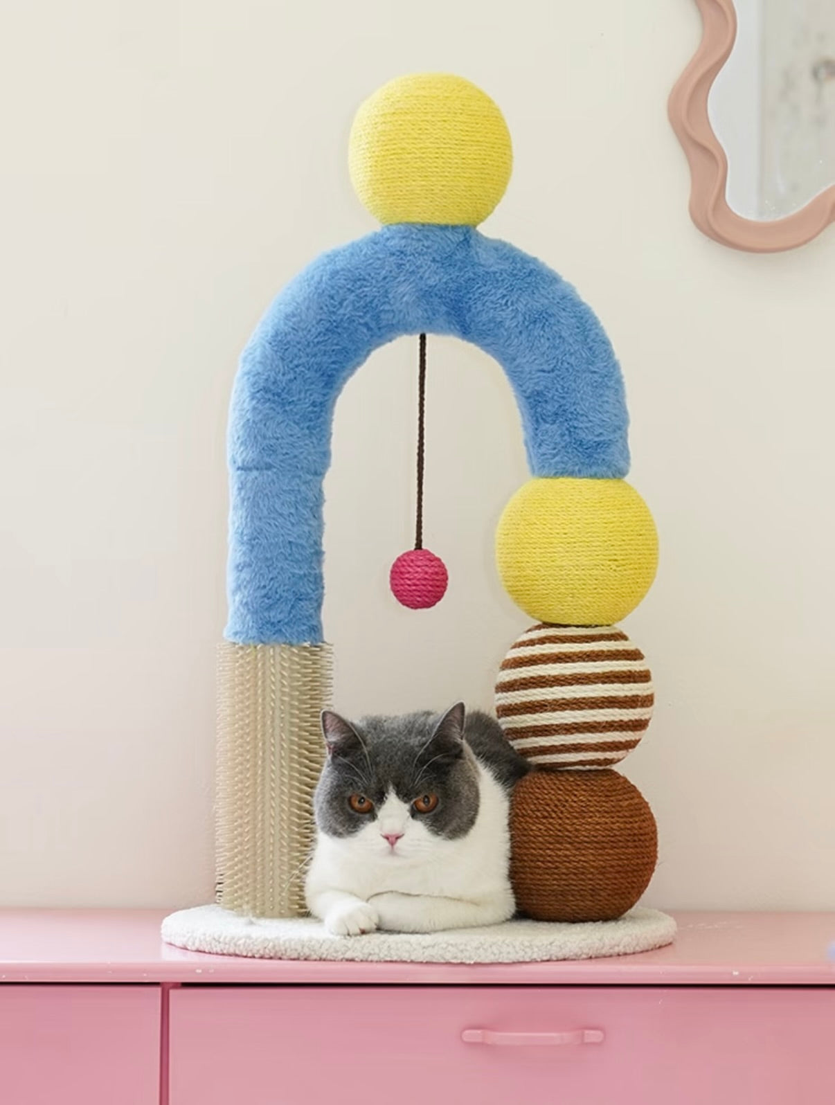 Zeze cat arch scratcher with sisal post and grooming brush. Stable, modern cat furniture for scratching and comfort.