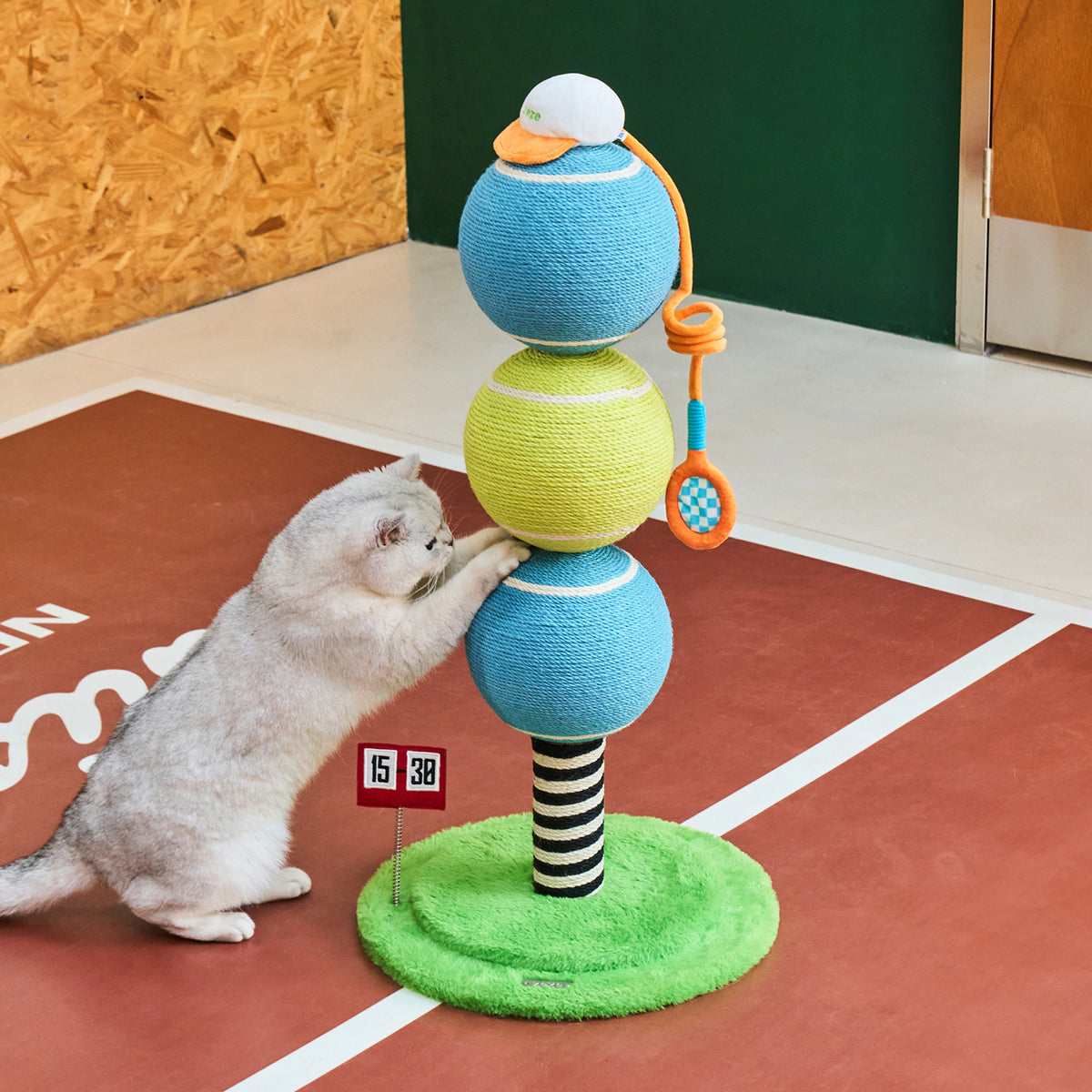 zeze ACE tennis cat scratching post with three rope tennis balls, racket toy and green base