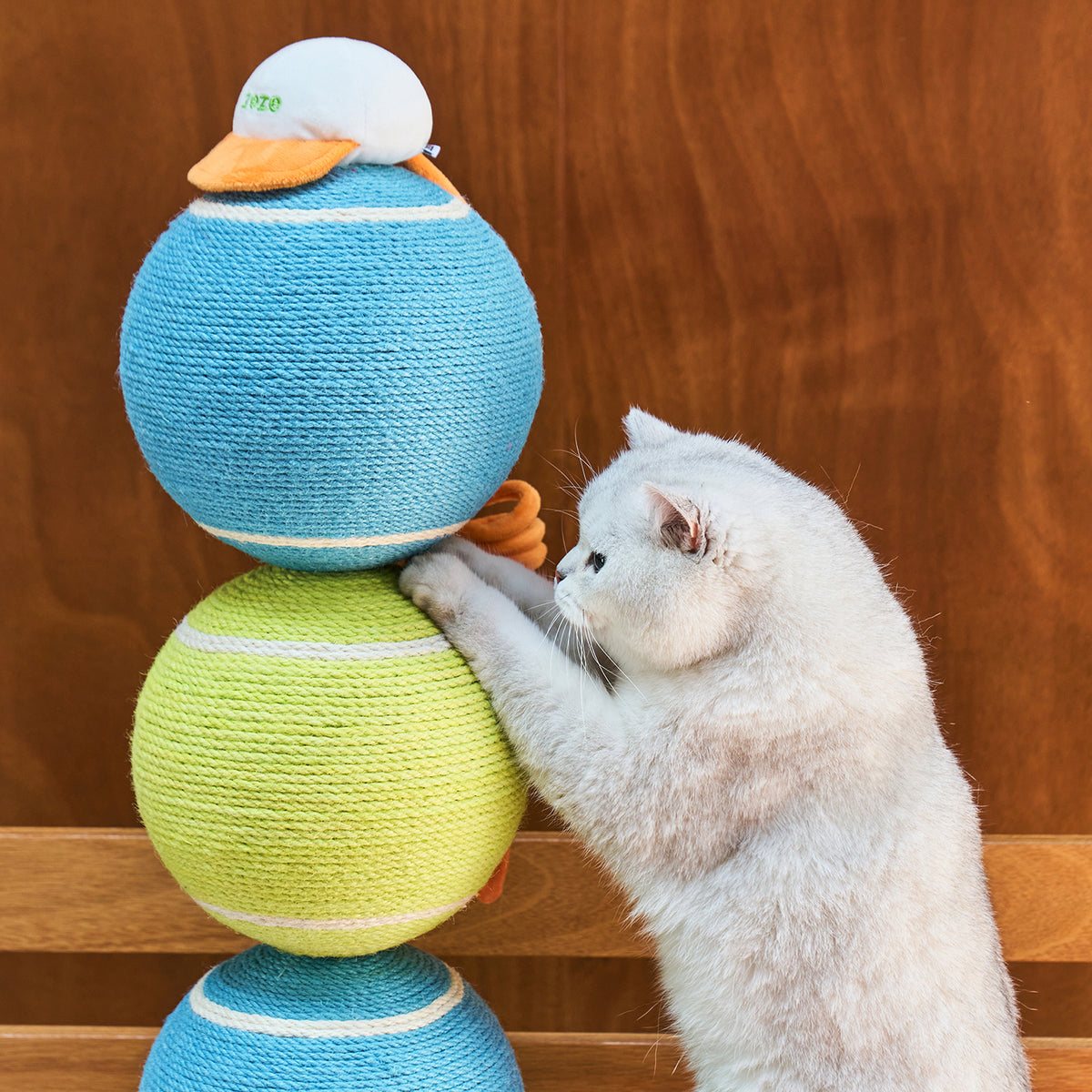 zeze ACE tennis cat scratching post with three rope tennis balls, racket toy and green base