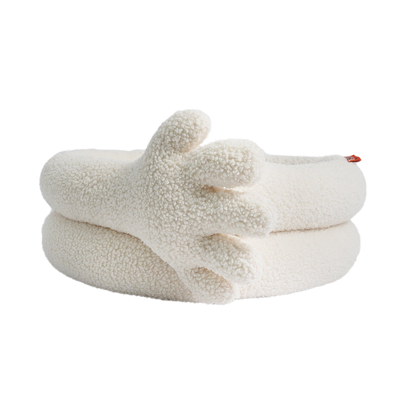 zeze Thank You Pet Bed: cream plush round bed with a large soft hand curled over the side