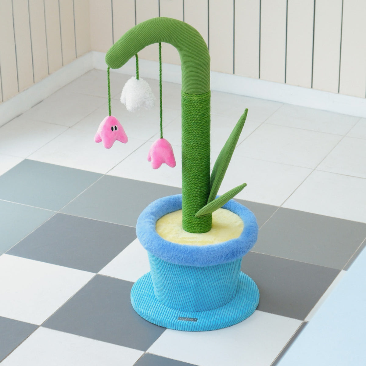 zeze Blooming Lily cat scratcher, product alone on a checked floor